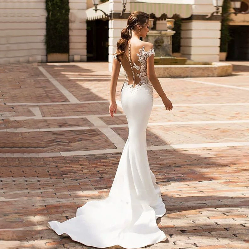 Exclusive Wedding Dress 2025 Spring New Deep Neck Hollow Mermaid Water-Soluble Lace Train Dress - Image 5